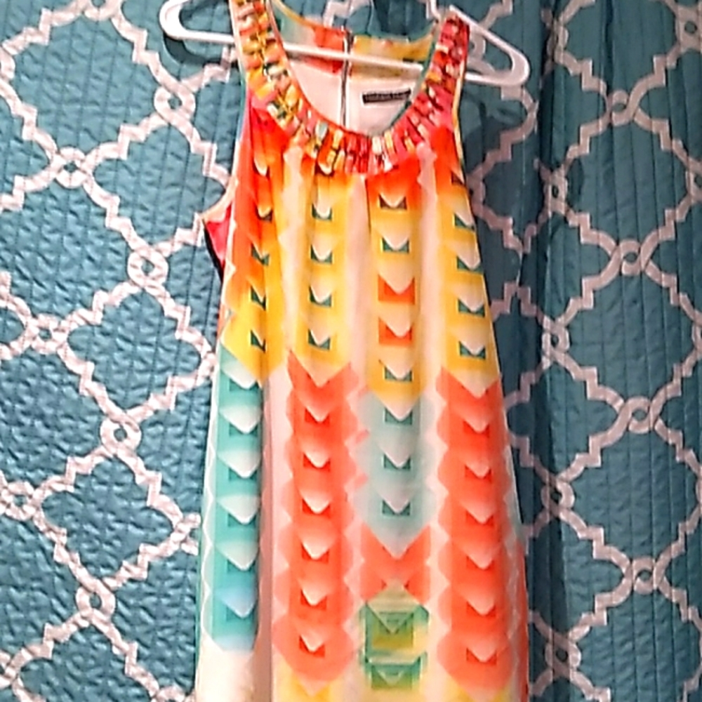 Madison Paige vibrant sun dress that looks like a sunrise. Great for hot weather